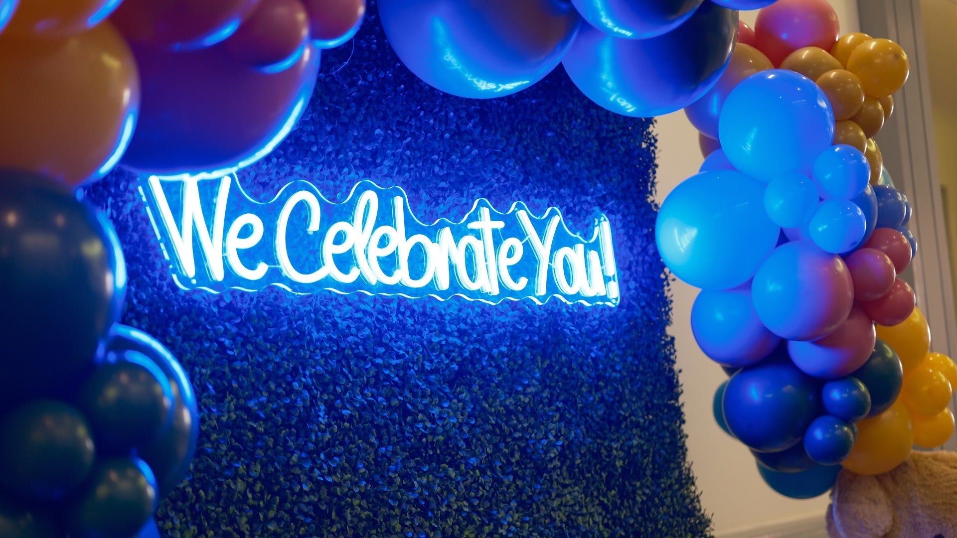 we celebrate you neon sign